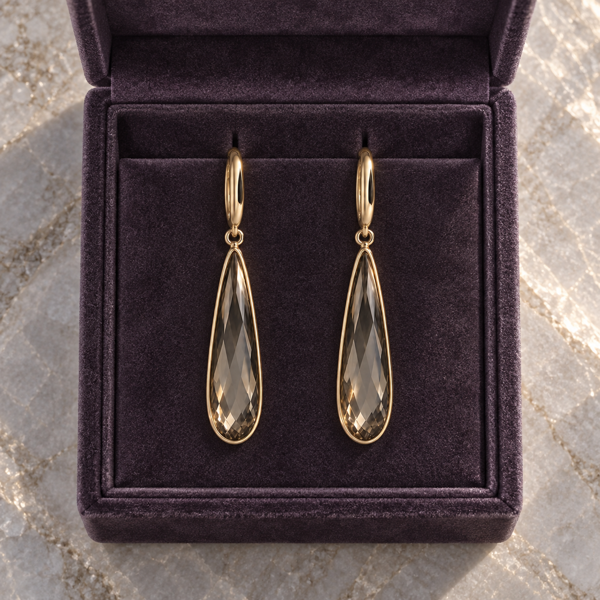 Astra Drop Earrings in their presentation box