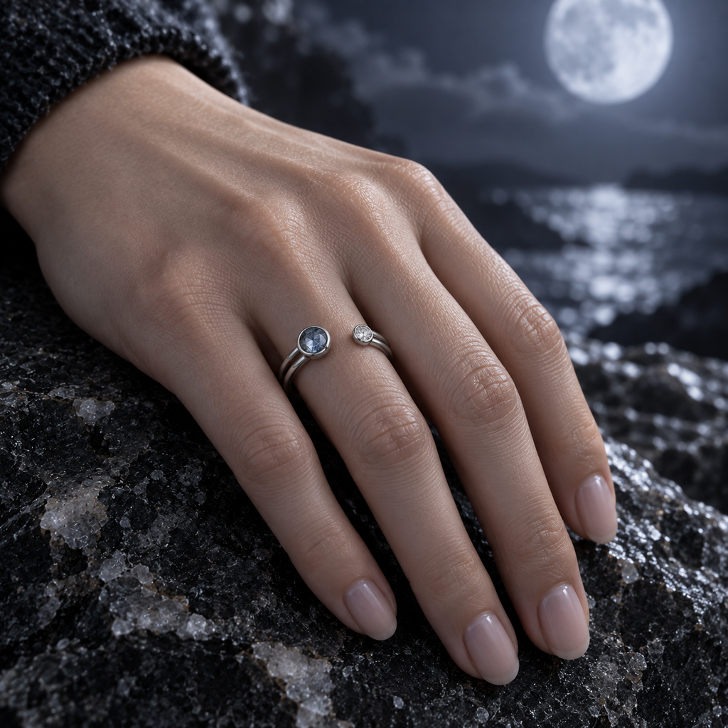 Caelum Twin Arc Ring worn on the ring finger