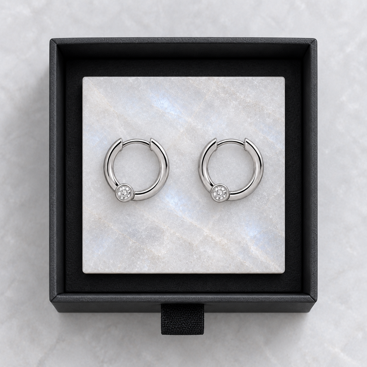 Lyra Huggie Pair in presentation packaging