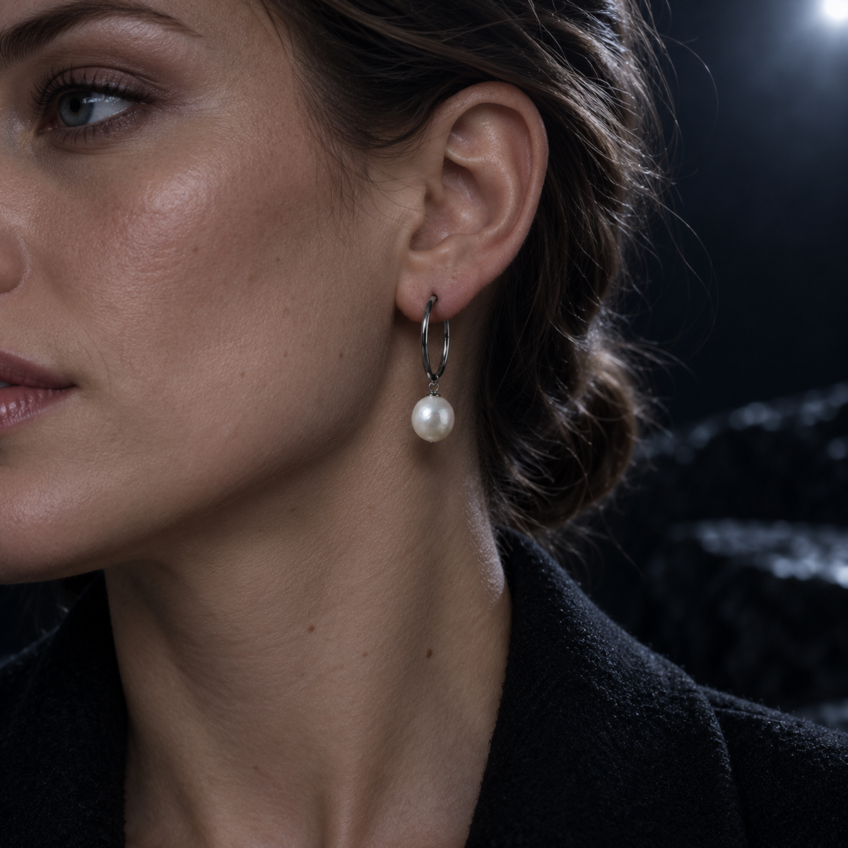 Noctis Pearl Hoop worn below the earlobe